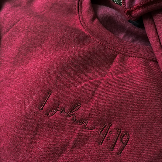 1 John 4:19 Tee