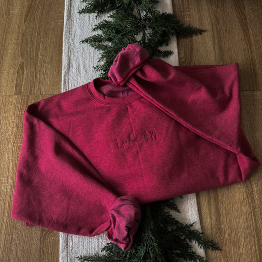1 John 4:19 Sweatshirt